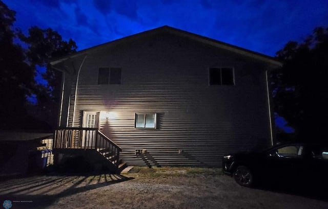 view of back house at night