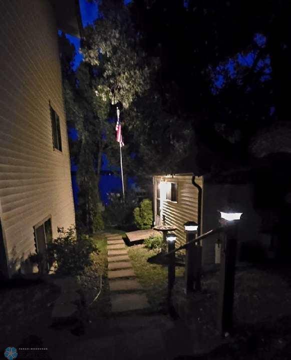 view of property exterior at twilight