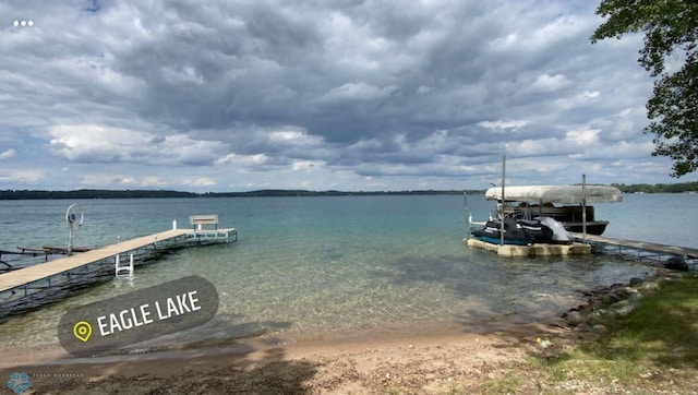 dock area featuring a water view