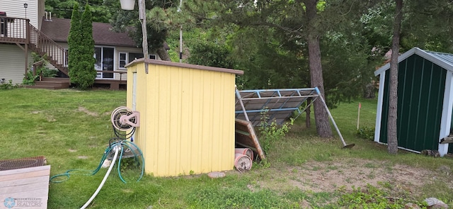 view of outdoor structure featuring a yard