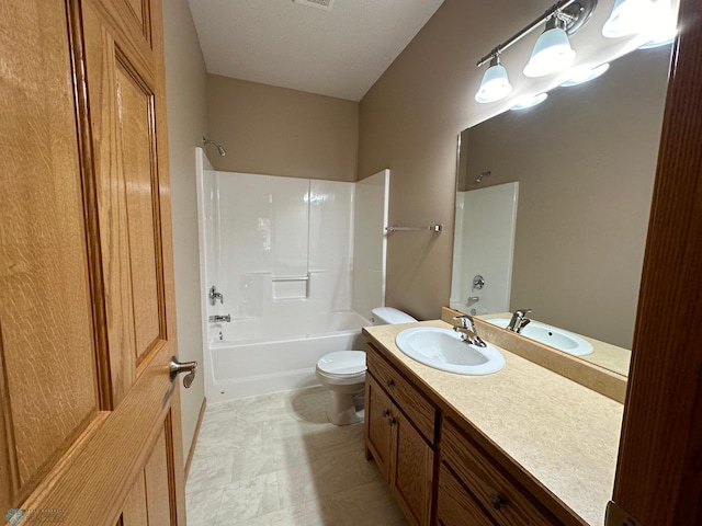 full bathroom featuring tile patterned flooring, washtub / shower combination, toilet, and vanity