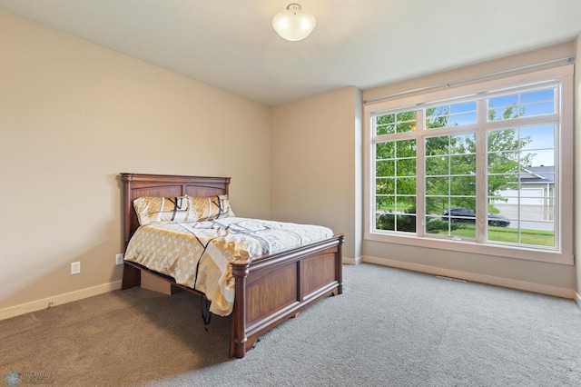 bedroom with light carpet