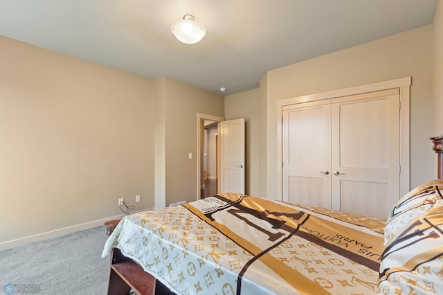 bedroom with carpet floors and a closet