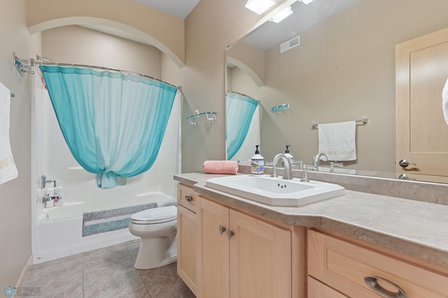 full bathroom with tile patterned floors, shower / bath combination with curtain, toilet, and vanity