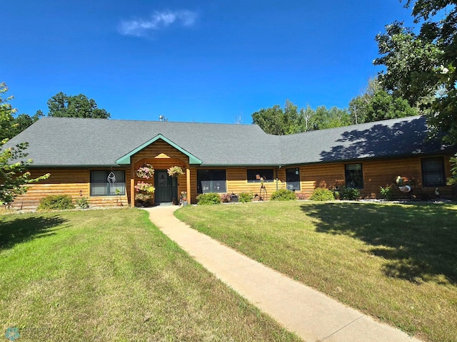 ranch-style home with a front yard