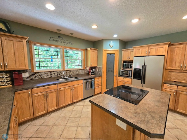 kitchen with appliances with stainless steel finishes, light tile patterned flooring, a center island, and backsplash