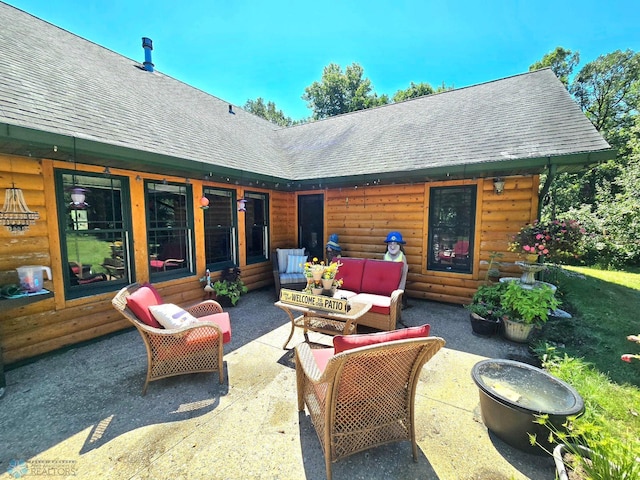 exterior space featuring a patio area and outdoor lounge area