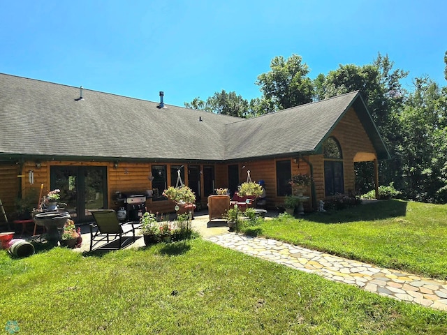 exterior space featuring a patio and a lawn