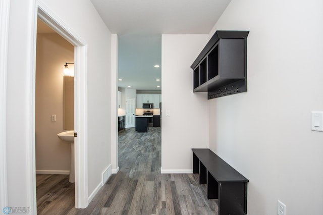 hall featuring hardwood / wood-style flooring