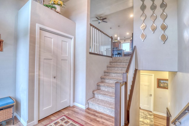 entrance foyer with light wood-type flooring and ceiling fan