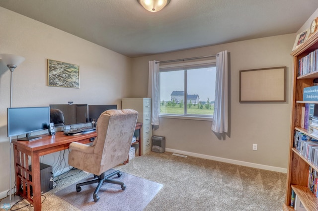 view of carpeted office space