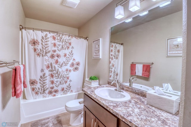 full bathroom featuring vanity, toilet, and shower / bathtub combination with curtain