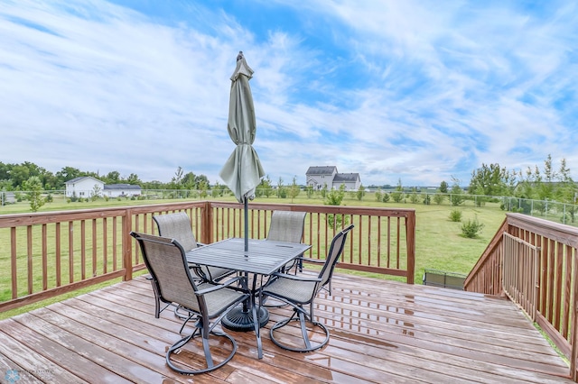 wooden deck with a yard