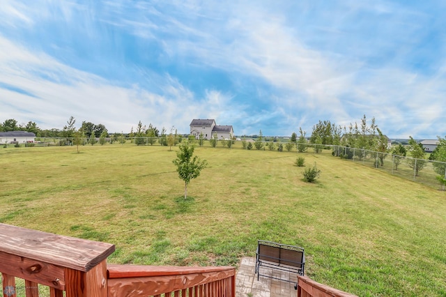 view of yard with a rural view