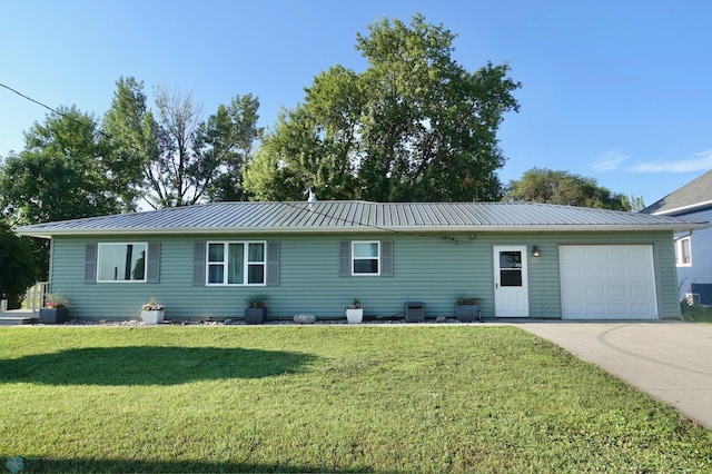 single story home with a garage and a front yard