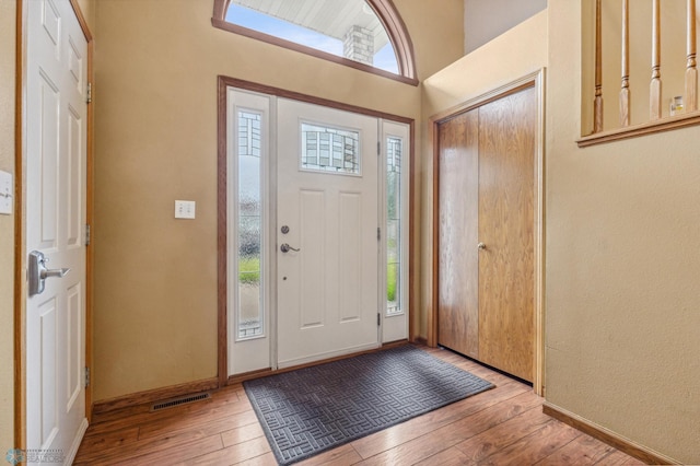 entrance foyer featuring light hardwood / wood-style floors