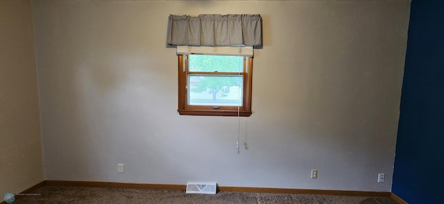 view of carpeted spare room