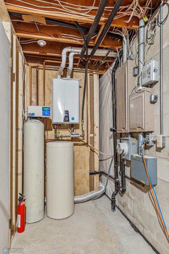 utility room with water heater and gas water heater