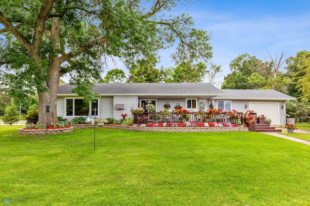 single story home with a front lawn and a garage