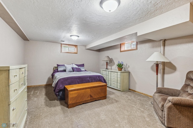 carpeted bedroom with a textured ceiling