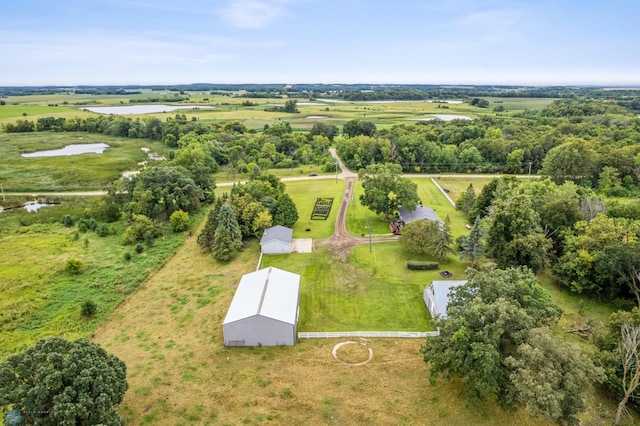 aerial view with a water view and a rural view