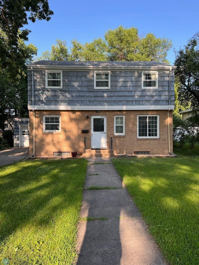 view of front of home with a front yard