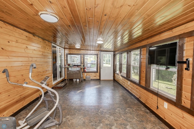 sunroom / solarium featuring wood ceiling