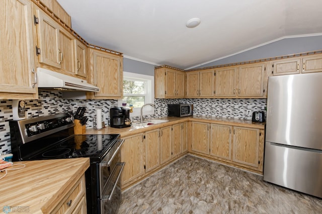 kitchen featuring light tile patterned floors, appliances with stainless steel finishes, sink, and backsplash