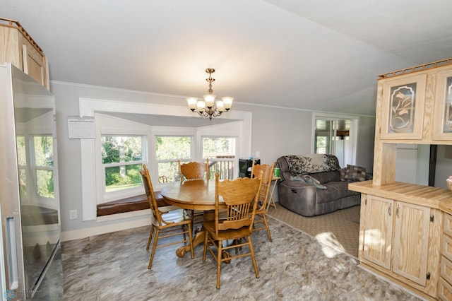 dining area with a notable chandelier