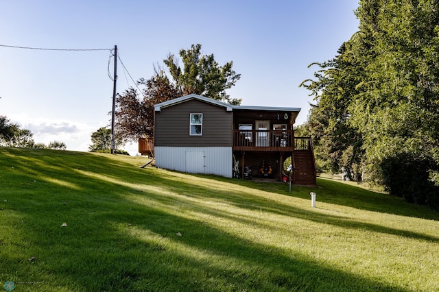 exterior space with a wooden deck and a yard