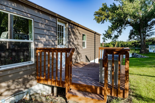 deck featuring a yard