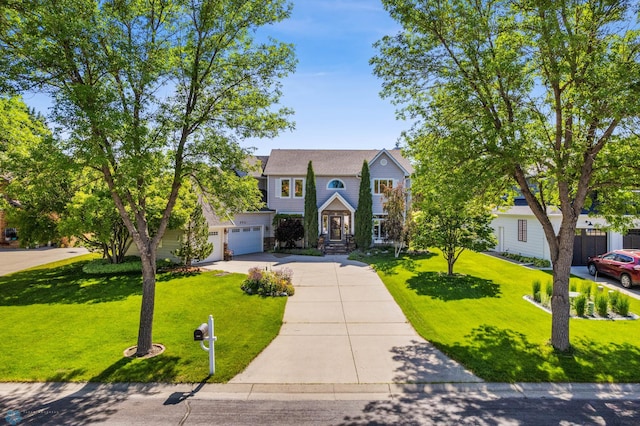 view of front facade featuring a garage and a front yard