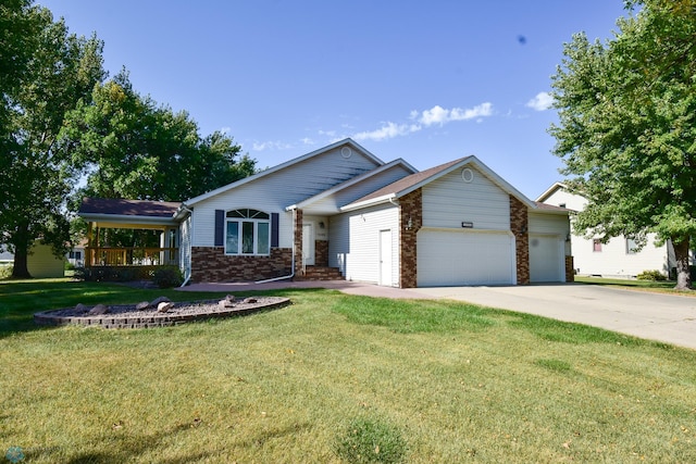 single story home featuring a garage and a front lawn