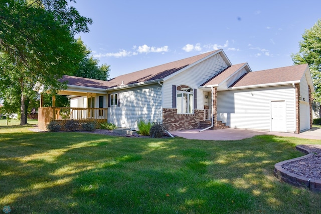 ranch-style home with a garage and a front yard