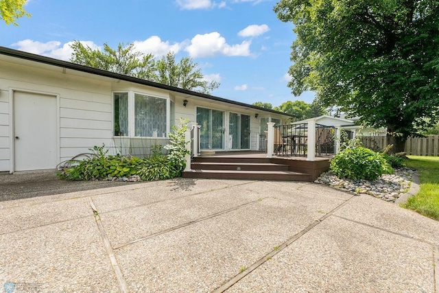 exterior space featuring a patio and a deck