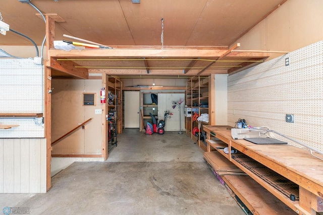 basement with a workshop area