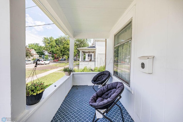 view of patio featuring a porch