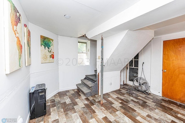 basement featuring wood-type flooring