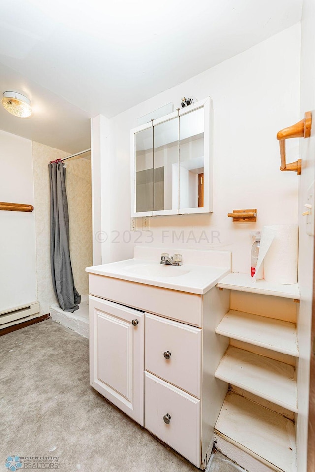 bathroom featuring vanity and a baseboard radiator