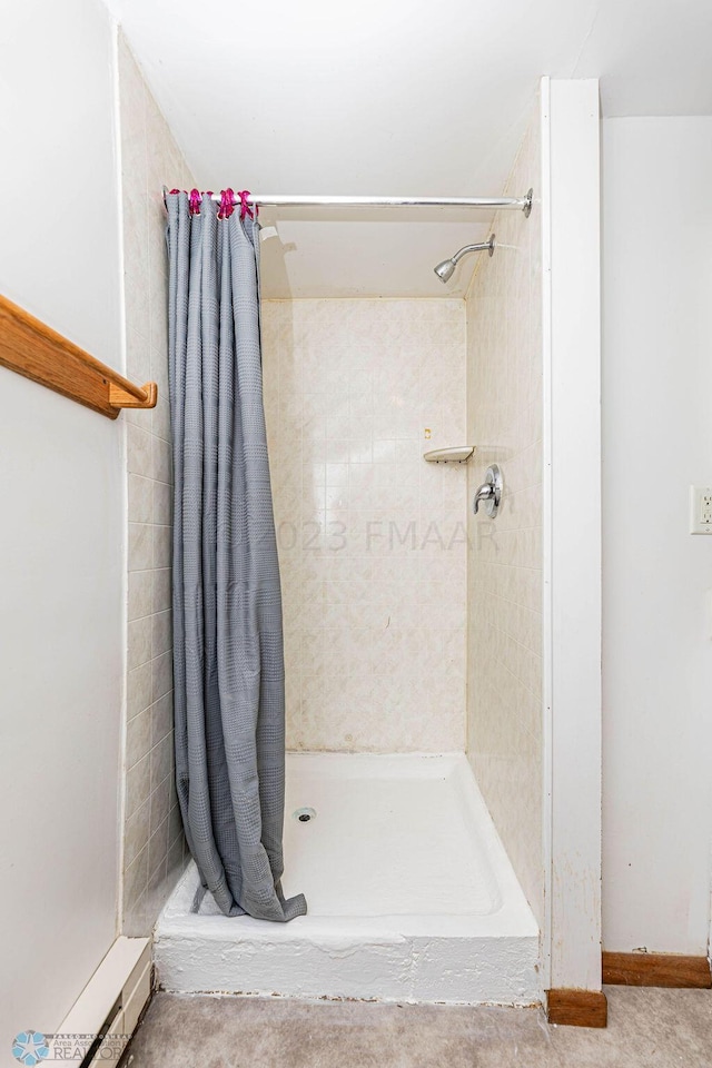 bathroom with a shower with shower curtain