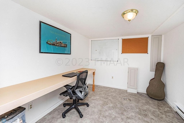 home office featuring light carpet and a baseboard radiator