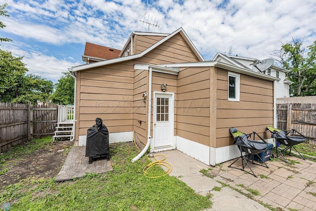 rear view of property with a patio