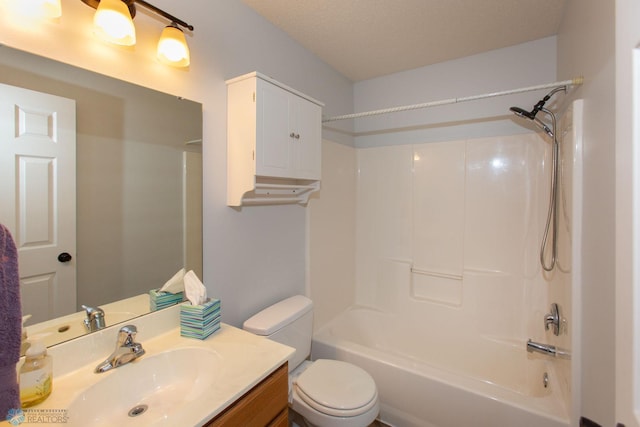 full bathroom with shower / tub combination, vanity, toilet, and a textured ceiling