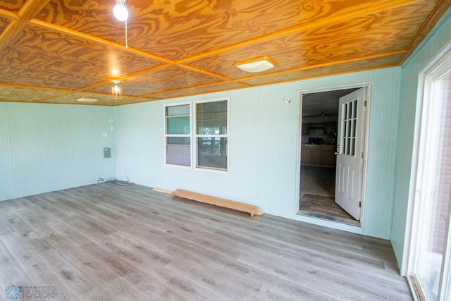 unfurnished room featuring wooden ceiling and wood-type flooring