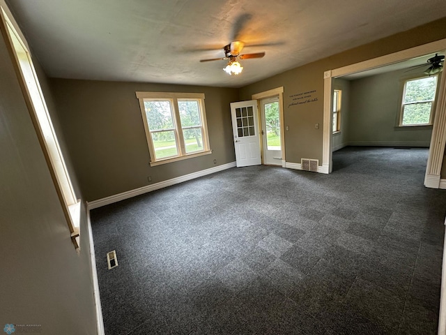 interior space featuring ceiling fan