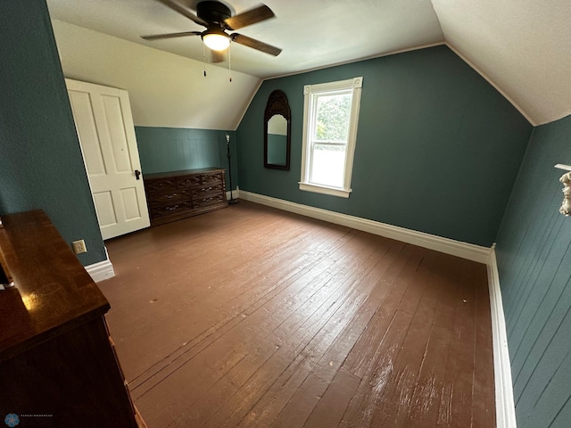 bonus room featuring ceiling fan, vaulted ceiling, and wood-type flooring