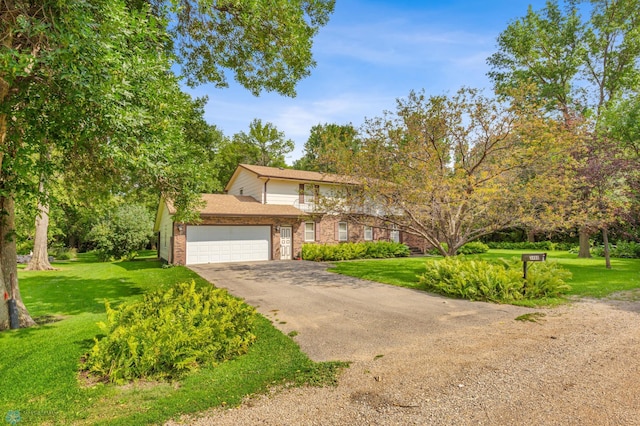 view of front facade featuring a garage and a front lawn