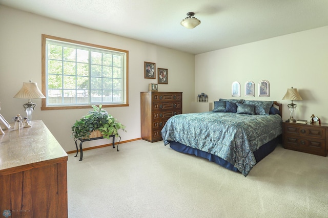 bedroom with light carpet