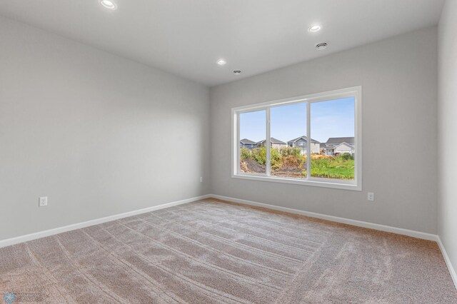 unfurnished room featuring carpet floors