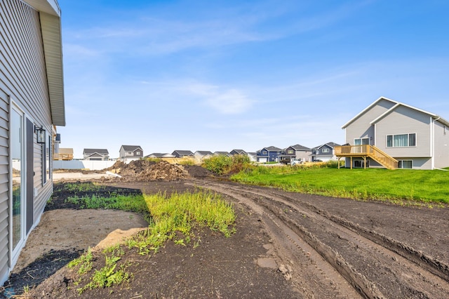 view of yard with a wooden deck